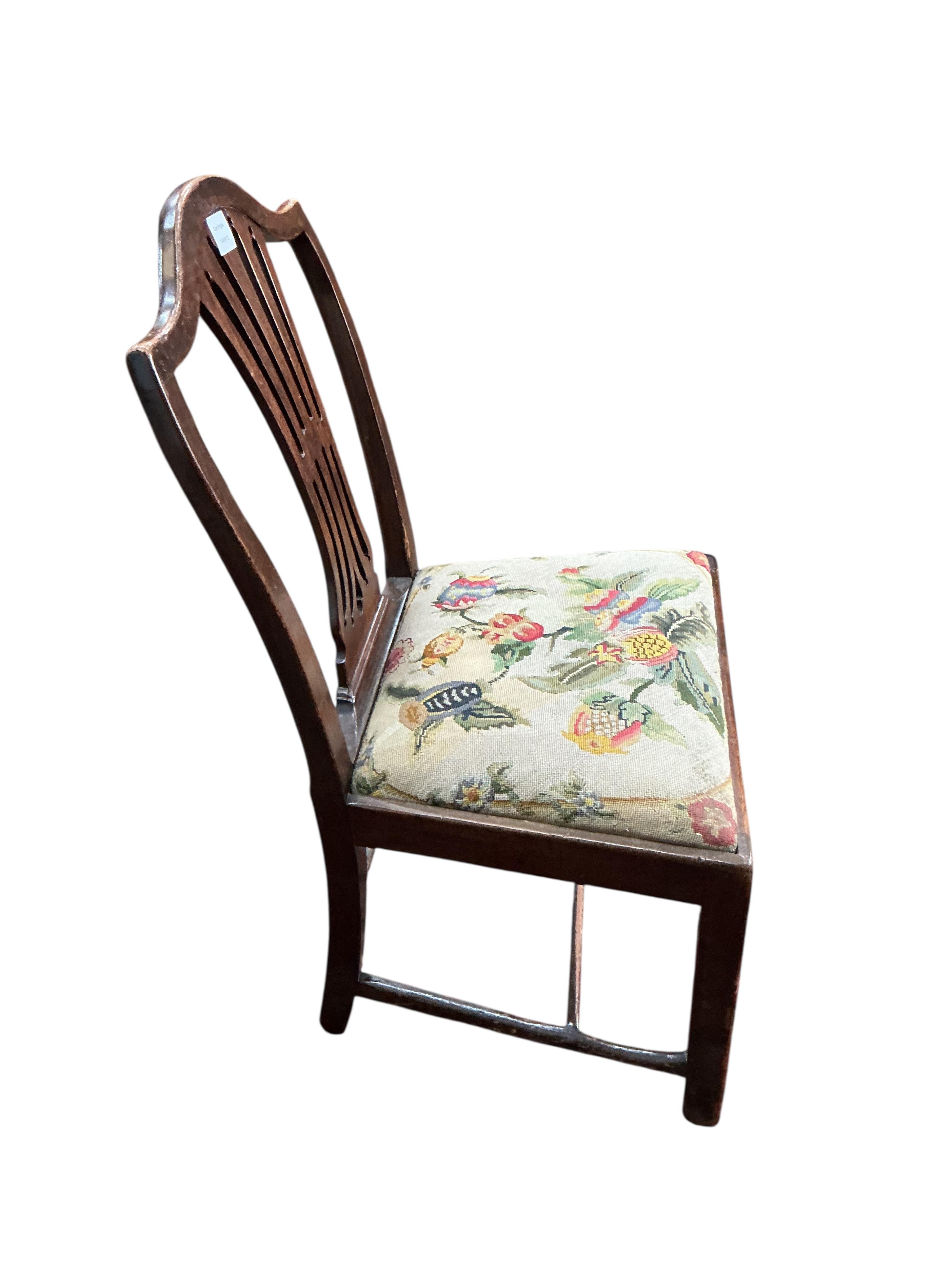 A George III mahogany dining chair and a later George III style inlaid mahogany elbow chair
